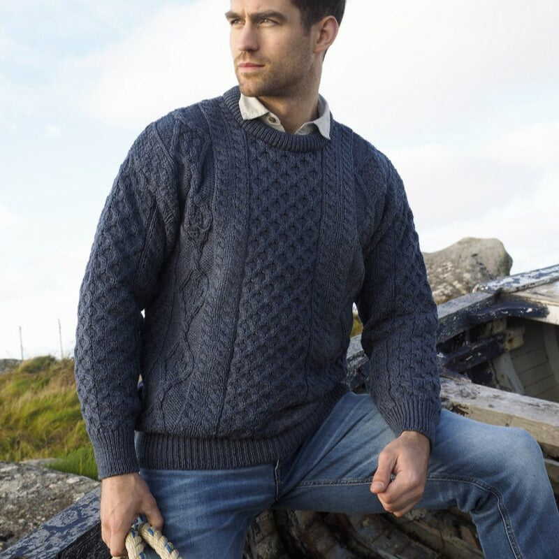 Irish Aran Knit Sweater – Timeless Craftsmanship and Comfort

Discover the perfect blend of tradition and style with our unisex Irish Aran Knit Sweater, crafted in Ireland using 100% super-soft Merino wool. 🌿

Luxurious Comfort: Soft, durable, and naturally breathable for year-round wear.
Rich Heritage: Features iconic Aran stitches like cable, honeycomb, and diamond, symbolizing strength, luck, and connection.
Crafted in Ireland: Made with care by skilled artisans, celebrating Irish knitting traditions.

