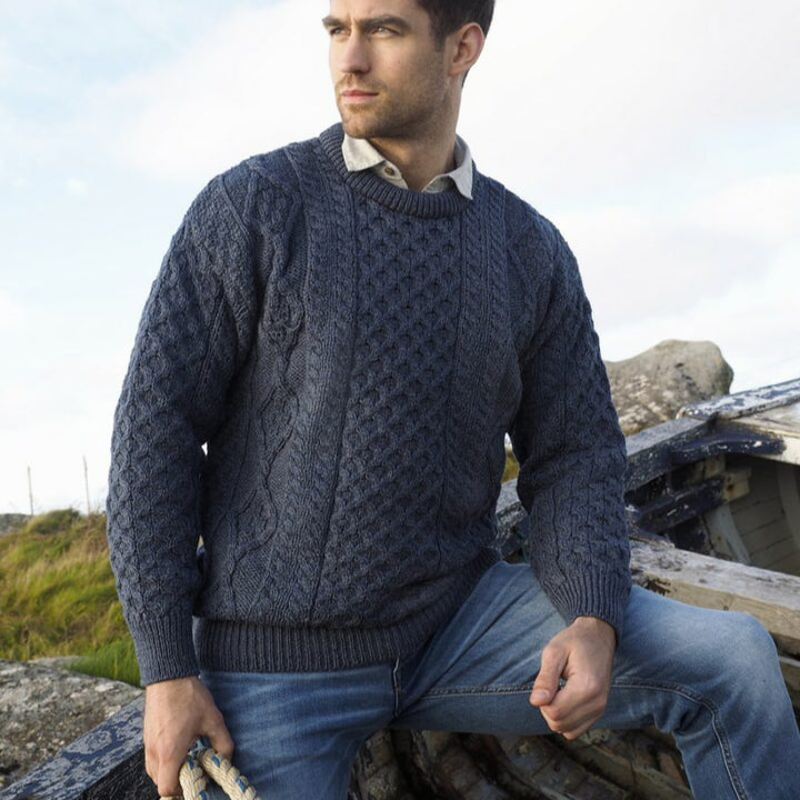 Irish Aran Knit Sweater – Timeless Craftsmanship and Comfort

Discover the perfect blend of tradition and style with our unisex Irish Aran Knit Sweater, crafted in Ireland using 100% super-soft Merino wool. 🌿

Luxurious Comfort: Soft, durable, and naturally breathable for year-round wear.
Rich Heritage: Features iconic Aran stitches like cable, honeycomb, and diamond, symbolizing strength, luck, and connection.
Crafted in Ireland: Made with care by skilled artisans, celebrating Irish knitting traditions.

