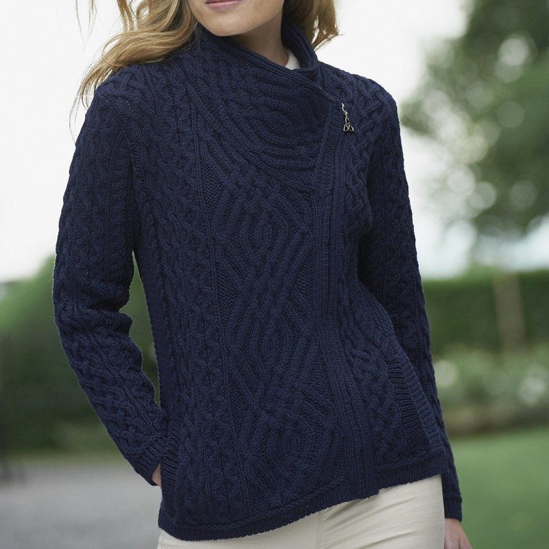 ☘️ Ladies Irish-Made Side-Zip Cable Knit Aran Cardigan 🧶
Biker Style Meets Timeless Irish Craftsmanship

Elevate your wardrobe with the Ladies Irish-Made Side-Zip Cable Knit Aran Cardigan, a bold take on traditional Aran knitwear with a modern, biker-inspired twist.

🌟 Key Features You’ll Love:
🧵 Premium Material: Made from 100% Supersoft Merino Wool for unmatched warmth, softness, and comfort.
🪡 Stylish Design: Features a unique side-zip closure, adding a modern biker edge to the classic Aran cardigan.