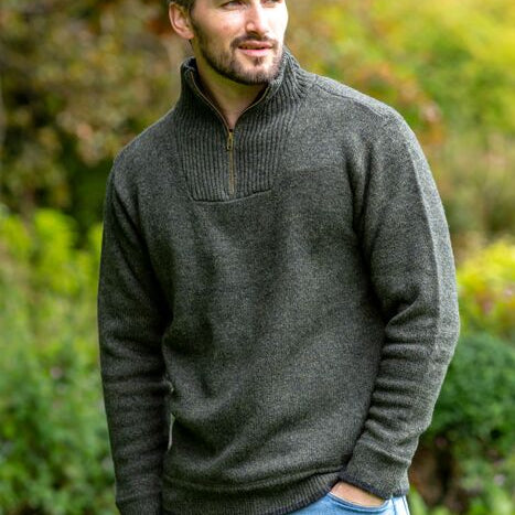 Ireland's Eye Half Zip Sweater – Timeless Luxury and Style

Introducing our Ireland's Eye Half Zip Sweater, a wardrobe essential crafted from 100% lambswool for exceptional softness, warmth, and comfort. This sweater seamlessly blends classic style with superior quality, making it a versatile piece for both casual and formal occasions.

Key Features:

Premium 100% Lambswool: Experience the luxury of lambswool, known for its unmatched softness, warmth, and breathable comfort.
