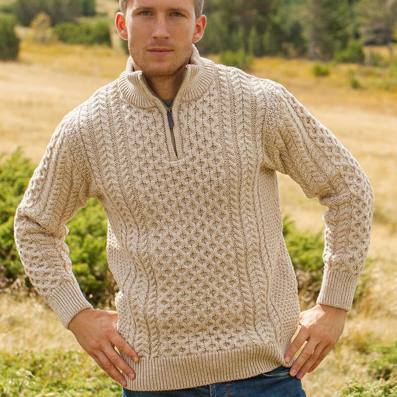 Elevate your wardrobe with our Men’s Irish Full-Zip Aran Sweater, crafted for the modern gentleman who values warmth, comfort, and heritage. This versatile sweater seamlessly blends traditional Irish craftsmanship with contemporary functionality.

🌟 Key Features
🐑 Premium Material: Made from 100% Merino wool, delivering exceptional softness, warmth, and breathability—perfect for cool weather or layering.
🌀 Classic Aran Stitching: Showcasing traditional Aran patterns on both the front and back, celebratin