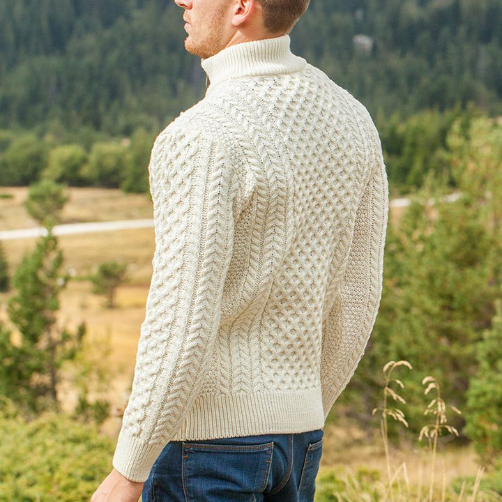 Elevate your wardrobe with our Men’s Irish Full-Zip Aran Sweater, crafted for the modern gentleman who values warmth, comfort, and heritage. This versatile sweater seamlessly blends traditional Irish craftsmanship with contemporary functionality.

🌟 Key Features
🐑 Premium Material: Made from 100% Merino wool, delivering exceptional softness, warmth, and breathability—perfect for cool weather or layering.
🌀 Classic Aran Stitching: Showcasing traditional Aran patterns on both the front and back, celebratin