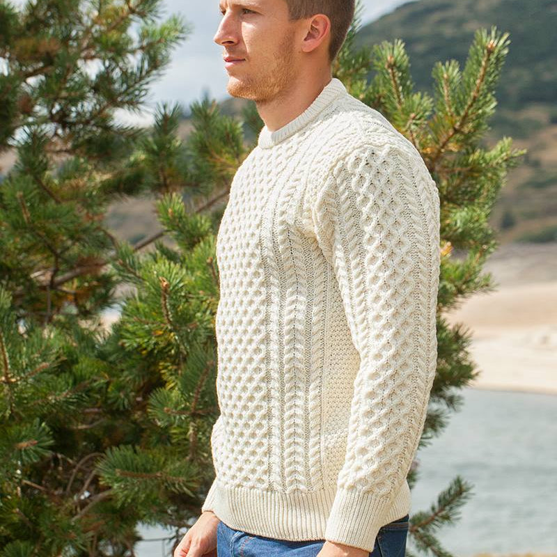 Irish Aran Knit Sweater – Timeless Craftsmanship and Comfort

Discover the perfect blend of tradition and style with our unisex Irish Aran Knit Sweater, crafted in Ireland using 100% super-soft Merino wool. 🌿

Luxurious Comfort: Soft, durable, and naturally breathable for year-round wear.
Rich Heritage: Features iconic Aran stitches like cable, honeycomb, and diamond, symbolizing strength, luck, and connection.
Crafted in Ireland: Made with care by skilled artisans, celebrating Irish knitting traditions.
