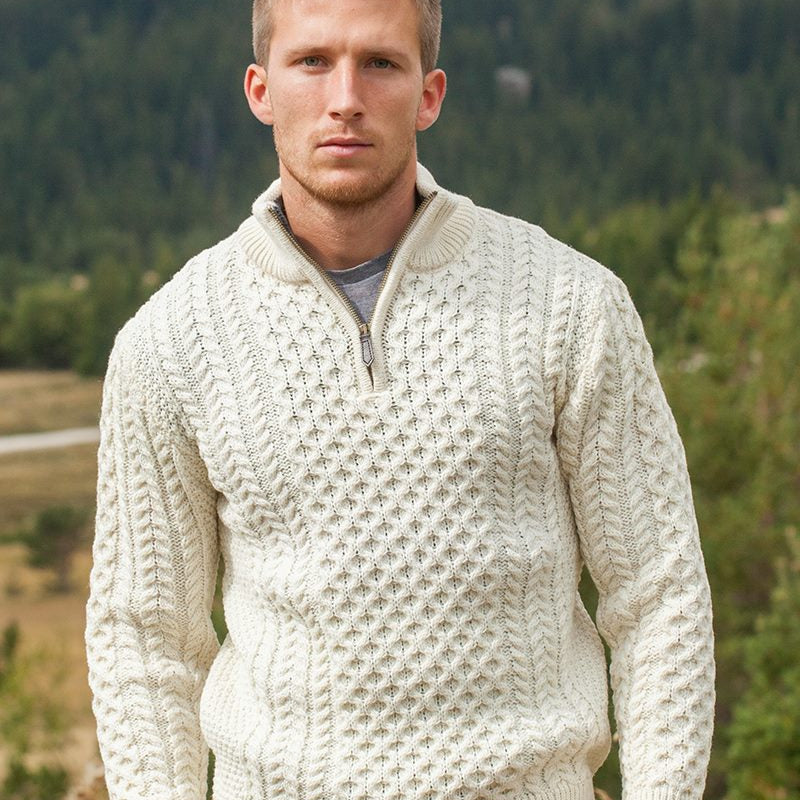 Elevate your wardrobe with our Men’s Irish Full-Zip Aran Sweater, crafted for the modern gentleman who values warmth, comfort, and heritage. This versatile sweater seamlessly blends traditional Irish craftsmanship with contemporary functionality.

🌟 Key Features
🐑 Premium Material: Made from 100% Merino wool, delivering exceptional softness, warmth, and breathability—perfect for cool weather or layering.
🌀 Classic Aran Stitching: Showcasing traditional Aran patterns on both the front and back, celebratin