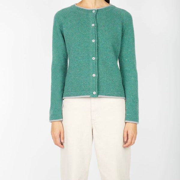 Indulge in the luxurious comfort and timeless elegance of the Killiney Cardigan, meticulously crafted by Ireland&