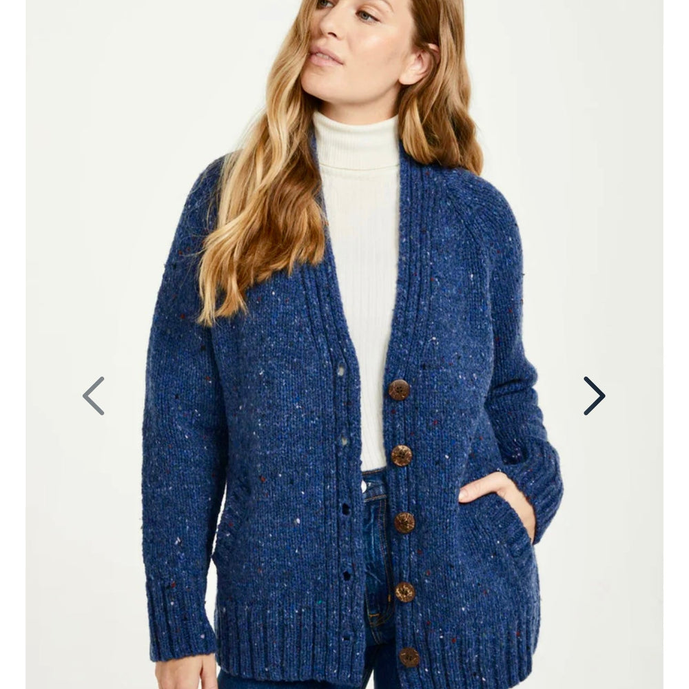 🌿 Bonny Glen Tweed Cardigan: Timeless Craftsmanship, Modern Flair 🧶

Embrace the charm of Irish heritage with the Bonny Glen Tweed Cardigan, a perfect blend of classic Aran knitwear and contemporary design.

🌟 Key Features You’ll Love:
🧵 Premium Material: Crafted from 100% Donegal Tweed, celebrated for its warmth, durability, and timeless charm.
🪡 Elegant Design: Features five expertly finished buttons and practical side pockets that marry functionality with style.