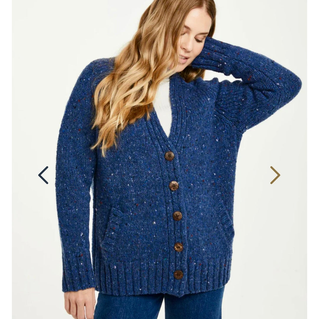 🌿 Bonny Glen Tweed Cardigan: Timeless Craftsmanship, Modern Flair 🧶

Embrace the charm of Irish heritage with the Bonny Glen Tweed Cardigan, a perfect blend of classic Aran knitwear and contemporary design.

🌟 Key Features You’ll Love:
🧵 Premium Material: Crafted from 100% Donegal Tweed, celebrated for its warmth, durability, and timeless charm.
🪡 Elegant Design: Features five expertly finished buttons and practical side pockets that marry functionality with style.