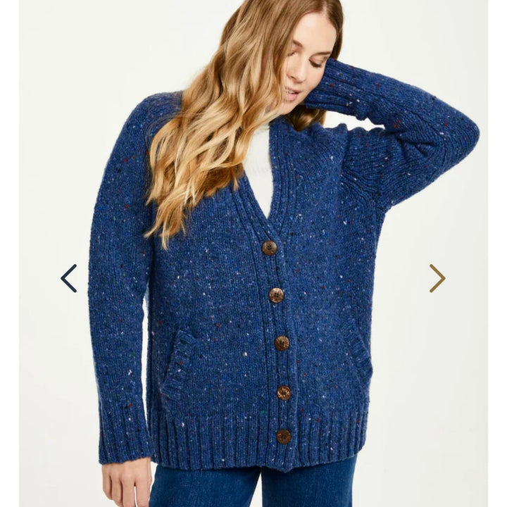 🌿 Bonny Glen Tweed Cardigan: Timeless Craftsmanship, Modern Flair 🧶

Embrace the charm of Irish heritage with the Bonny Glen Tweed Cardigan, a perfect blend of classic Aran knitwear and contemporary design.

🌟 Key Features You’ll Love:
🧵 Premium Material: Crafted from 100% Donegal Tweed, celebrated for its warmth, durability, and timeless charm.
🪡 Elegant Design: Features five expertly finished buttons and practical side pockets that marry functionality with style.