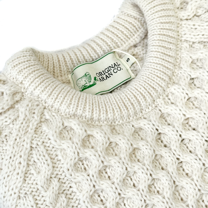 Irish Aran Knit Sweater – Timeless Craftsmanship and Comfort

Discover the perfect blend of tradition and style with our unisex Irish Aran Knit Sweater, crafted in Ireland using 100% super-soft Merino wool. 🌿

Luxurious Comfort: Soft, durable, and naturally breathable for year-round wear.
Rich Heritage: Features iconic Aran stitches like cable, honeycomb, and diamond, symbolizing strength, luck, and connection.
Crafted in Ireland: Made with care by skilled artisans, celebrating Irish knitting traditions.
