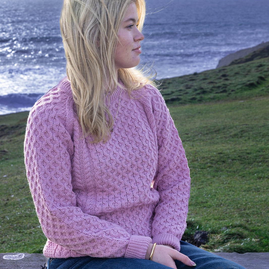 Irish Aran Knit Sweater – A Timeless Blend of Tradition &amp; Comfort 🇮🇪✨

Experience the perfect fusion of heritage and modern style with our unisex Irish Aran Knit Sweater, crafted in Ireland from 100% super-soft Merino wool. 🌿

✔️ Unmatched Comfort – Soft, breathable, and durable for all-season wear.
✔️ Authentic Aran Design – Showcasing classic stitches like cable, honeycomb, and diamond, each symbolizing strength, luck, and connection. 🍀