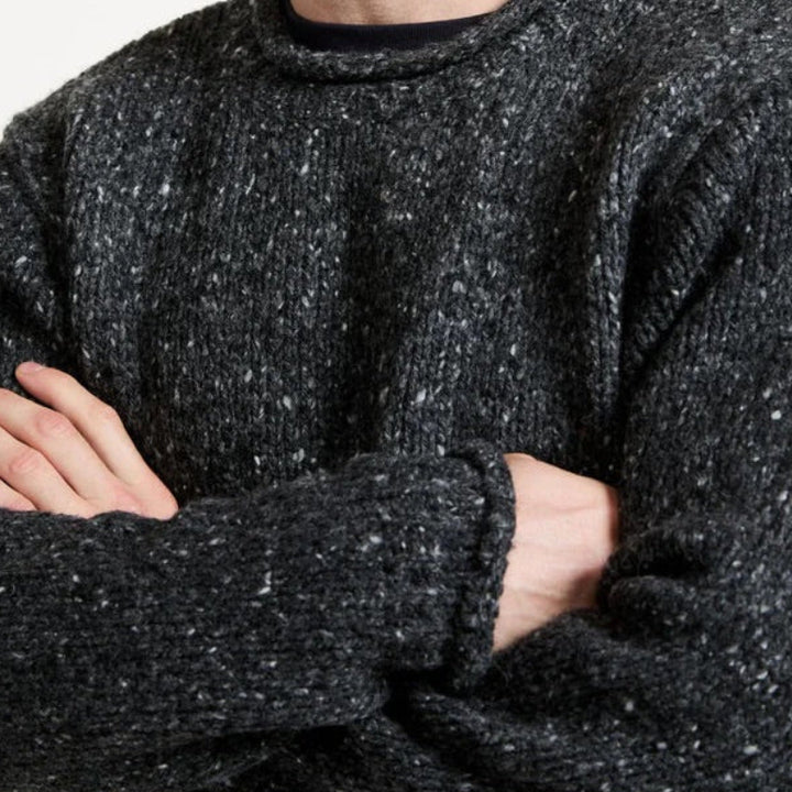 🧶 Raheen Tweed Roll Neck Sweater 🌿

Discover timeless elegance and contemporary style with our Raheen Tweed Roll Neck Sweater—the perfect fusion of heritage craftsmanship and modern design.

✨ Key Features:
✔️ 100% Pure New Wool: Luxuriously soft, warm, and durable.
✔️ Rolled Crew Neck: Adds a unique, stylish touch.
✔️ Ribbed Hem &amp;amp; Cuffs: Flattering, relaxed fit for ultimate comfort.
✔️ Seamless Design: Set-in sleeves and fully linked seams for a smooth, polished look.