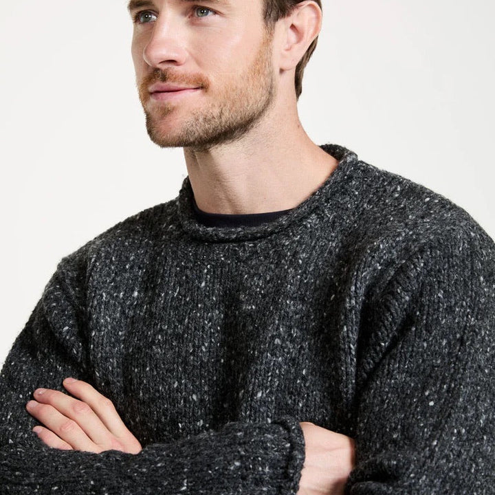 🧶 Raheen Tweed Roll Neck Sweater 🌿

Discover timeless elegance and contemporary style with our Raheen Tweed Roll Neck Sweater—the perfect fusion of heritage craftsmanship and modern design.

✨ Key Features:
✔️ 100% Pure New Wool: Luxuriously soft, warm, and durable.
✔️ Rolled Crew Neck: Adds a unique, stylish touch.
✔️ Ribbed Hem &amp;amp; Cuffs: Flattering, relaxed fit for ultimate comfort.
✔️ Seamless Design: Set-in sleeves and fully linked seams for a smooth, polished look.