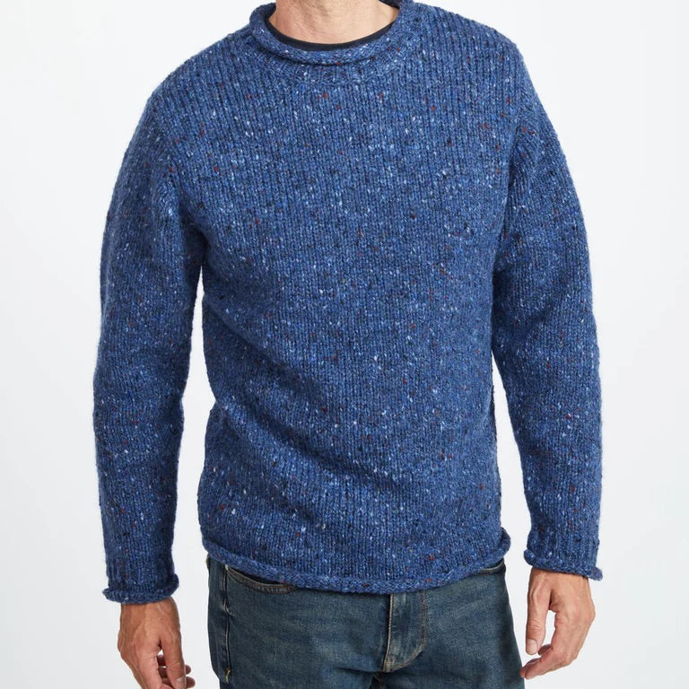Experience the perfect mix of tradition and modern design with the Raheen Tweed Roll Neck Sweater, crafted from 100% Pure New Wool.

✨ Key Features:

Material: Luxurious 100% Pure New Wool for warmth and comfort. 🐑
Design: Rolled crew neck with ribbed hem and cuffs for a relaxed yet flattering fit. 🎨
Details: Set-in sleeves and fully linked seams ensure a smooth, seamless finish. 🧵
Versatility: Perfect for layering or wearing solo, ideal for smart-casual or cozy weekends.