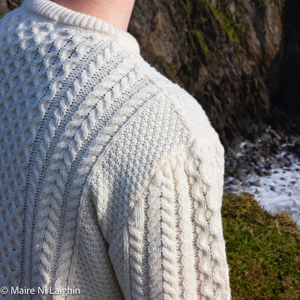 Irish Aran Knit Sweater – A Timeless Blend of Tradition & Comfort 🇮🇪✨

Experience the perfect fusion of heritage and modern style with our unisex Irish Aran Knit Sweater, crafted in Ireland from 100% super-soft Merino wool. 🌿

✔️ Unmatched Comfort – Soft, breathable, and durable for all-season wear.
✔️ Authentic Aran Design – Showcasing classic stitches like cable, honeycomb, and diamond, each symbolizing strength, luck, and connection. 🍀
✔️ Crafted in Ireland – Hand-finished by skilled artisans, 
