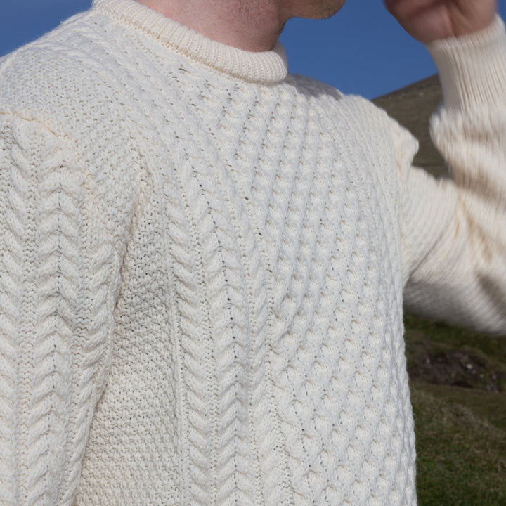 Irish Aran Knit Sweater – A Timeless Blend of Tradition &amp; Comfort 🇮🇪✨

Experience the perfect fusion of heritage and modern style with our unisex Irish Aran Knit Sweater, crafted in Ireland from 100% super-soft Merino wool. 🌿

✔️ Unmatched Comfort – Soft, breathable, and durable for all-season wear.
✔️ Authentic Aran Design – Showcasing classic stitches like cable, honeycomb, and diamond, each symbolizing strength, luck, and connection. 🍀
✔️ Crafted in Ireland – Hand-finished by skilled artisans, 