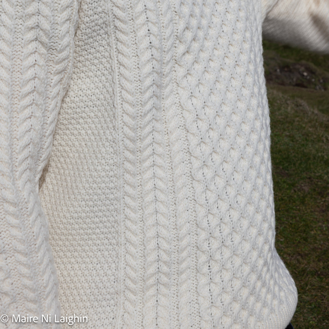 Irish Aran Knit Sweater – Timeless Craftsmanship and Comfort

Discover the perfect blend of tradition and style with our unisex Irish Aran Knit Sweater, crafted in Ireland using 100% super-soft Merino wool. 🌿

Luxurious Comfort: Soft, durable, and naturally breathable for year-round wear.
Rich Heritage: Features iconic Aran stitches like cable, honeycomb, and diamond, symbolizing strength, luck, and connection.
Crafted in Ireland: Made with care by skilled artisans, celebrating Irish knitting traditions.
