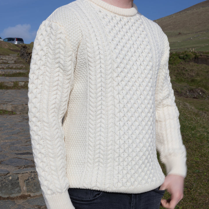 Irish Aran Knit Sweater – A Timeless Blend of Tradition &amp; Comfort 🇮🇪✨

Experience the perfect fusion of heritage and modern style with our unisex Irish Aran Knit Sweater, crafted in Ireland from 100% super-soft Merino wool. 🌿

✔️ Unmatched Comfort – Soft, breathable, and durable for all-season wear.
✔️ Authentic Aran Design – Showcasing classic stitches like cable, honeycomb, and diamond, each symbolizing strength, luck, and connection. 🍀
✔️ Crafted in Ireland – Hand-finished by skilled artisans, 