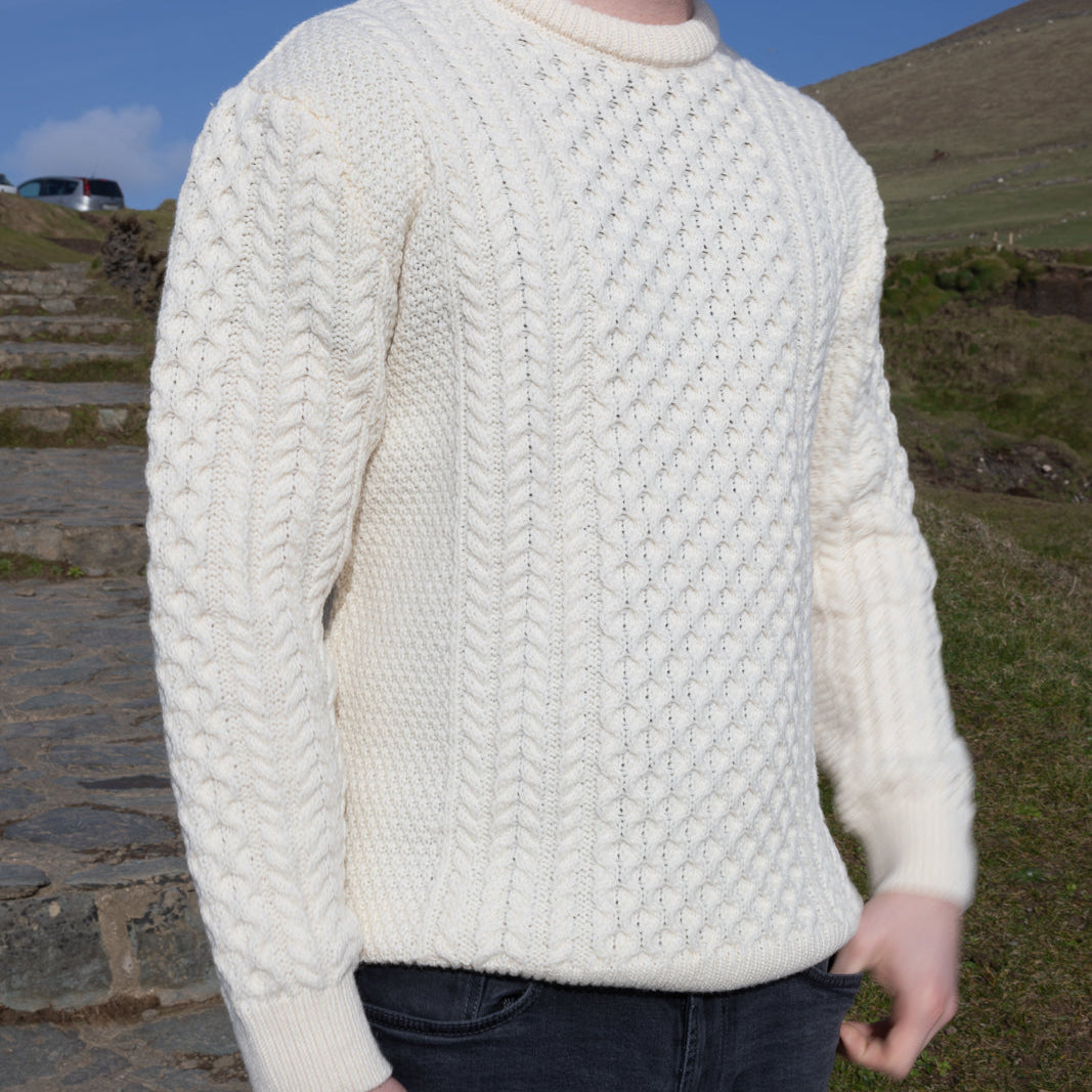Irish Aran Knit Sweater – A Timeless Blend of Tradition &amp; Comfort 🇮🇪✨

Experience the perfect fusion of heritage and modern style with our unisex Irish Aran Knit Sweater, crafted in Ireland from 100% super-soft Merino wool. 🌿

✔️ Unmatched Comfort – Soft, breathable, and durable for all-season wear.
✔️ Authentic Aran Design – Showcasing classic stitches like cable, honeycomb, and diamond, each symbolizing strength, luck, and connection. 🍀
