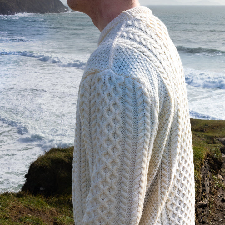 Irish Aran Knit Sweater – A Timeless Blend of Tradition &amp; Comfort 🇮🇪✨

Experience the perfect fusion of heritage and modern style with our unisex Irish Aran Knit Sweater, crafted in Ireland from 100% super-soft Merino wool. 🌿

✔️ Unmatched Comfort – Soft, breathable, and durable for all-season wear.
✔️ Authentic Aran Design – Showcasing classic stitches like cable, honeycomb, and diamond, each symbolizing strength, luck, and connection. 🍀
✔️ Crafted in Ireland – Hand-finished by skilled artisans, 