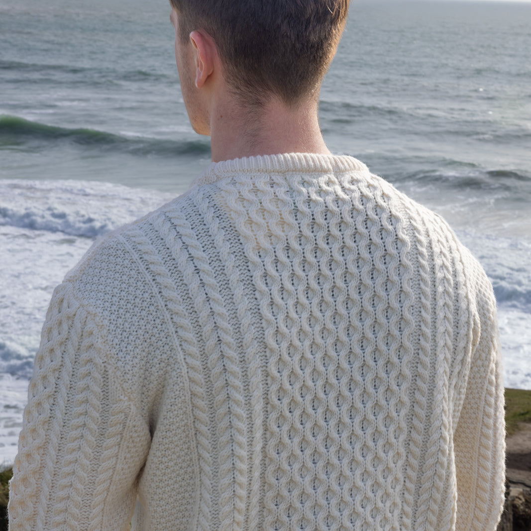 Irish Aran Knit Sweater – A Timeless Blend of Tradition &amp; Comfort 🇮🇪✨

Experience the perfect fusion of heritage and modern style with our unisex Irish Aran Knit Sweater, crafted in Ireland from 100% super-soft Merino wool. 🌿

✔️ Unmatched Comfort – Soft, breathable, and durable for all-season wear.
✔️ Authentic Aran Design – Showcasing classic stitches like cable, honeycomb, and diamond, each symbolizing strength, luck, and connection. 🍀
✔️ Crafted in Ireland – Hand-finished by skilled artisans, 