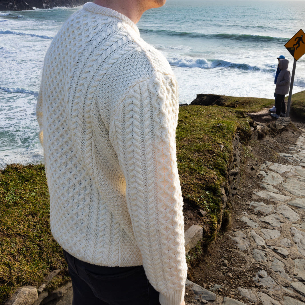 Irish Aran Knit Sweater – A Timeless Blend of Tradition &amp; Comfort 🇮🇪✨

Experience the perfect fusion of heritage and modern style with our unisex Irish Aran Knit Sweater, crafted in Ireland from 100% super-soft Merino wool. 🌿

✔️ Unmatched Comfort – Soft, breathable, and durable for all-season wear.
✔️ Authentic Aran Design – Showcasing classic stitches like cable, honeycomb, and diamond, each symbolizing strength, luck, and connection. 🍀
✔️ Crafted in Ireland – Hand-finished by skilled artisans, 