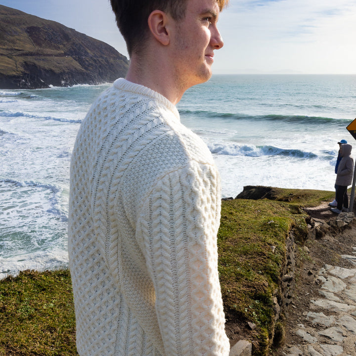 Irish Aran Knit Sweater – Timeless Craftsmanship and Comfort

Discover the perfect blend of tradition and style with our unisex Irish Aran Knit Sweater, crafted in Ireland using 100% super-soft Merino wool. 🌿

Luxurious Comfort: Soft, durable, and naturally breathable for year-round wear.
Rich Heritage: Features iconic Aran stitches like cable, honeycomb, and diamond, symbolizing strength, luck, and connection.
Crafted in Ireland: Made with care by skilled artisans, celebrating Irish knitting traditions.
