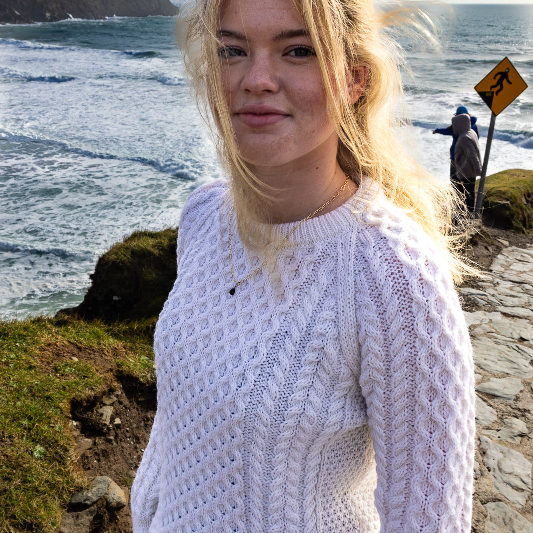 Irish Aran Knit Sweater – A Timeless Blend of Tradition &amp; Comfort 🇮🇪✨

Experience the perfect fusion of heritage and modern style with our unisex Irish Aran Knit Sweater, crafted in Ireland from 100% super-soft Merino wool. 🌿

✔️ Unmatched Comfort – Soft, breathable, and durable for all-season wear.
✔️ Authentic Aran Design – Showcasing classic stitches like cable, honeycomb, and diamond, each symbolizing strength, luck, and connection. 🍀