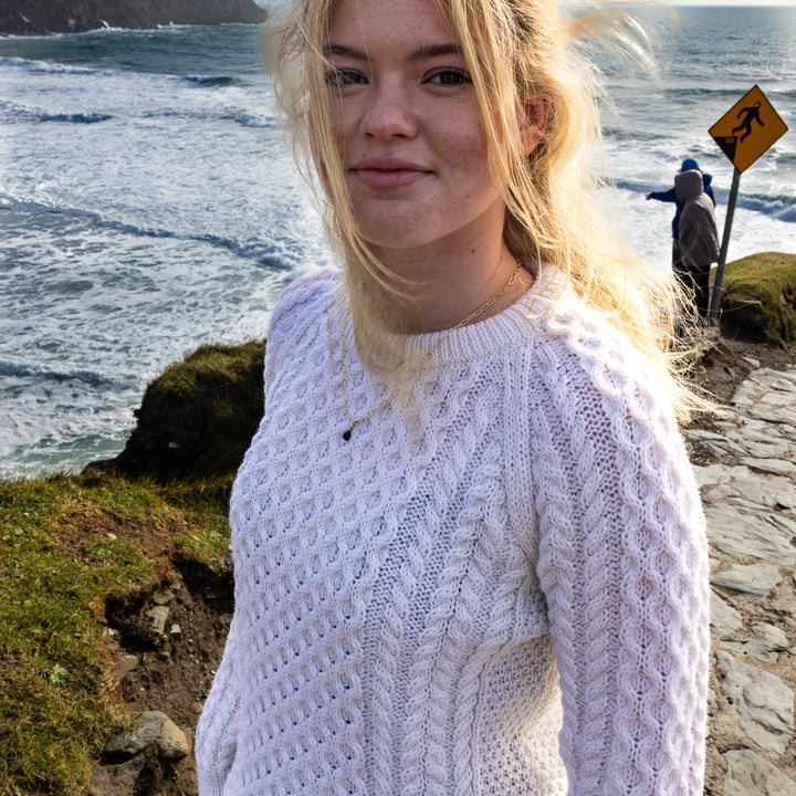 Irish Aran Knit Sweater – A Timeless Blend of Tradition &amp; Comfort 🇮🇪✨

Experience the perfect fusion of heritage and modern style with our unisex Irish Aran Knit Sweater, crafted in Ireland from 100% super-soft Merino wool. 🌿

✔️ Unmatched Comfort – Soft, breathable, and durable for all-season wear.
✔️ Authentic Aran Design – Showcasing classic stitches like cable, honeycomb, and diamond, each symbolizing strength, luck, and connection. 🍀