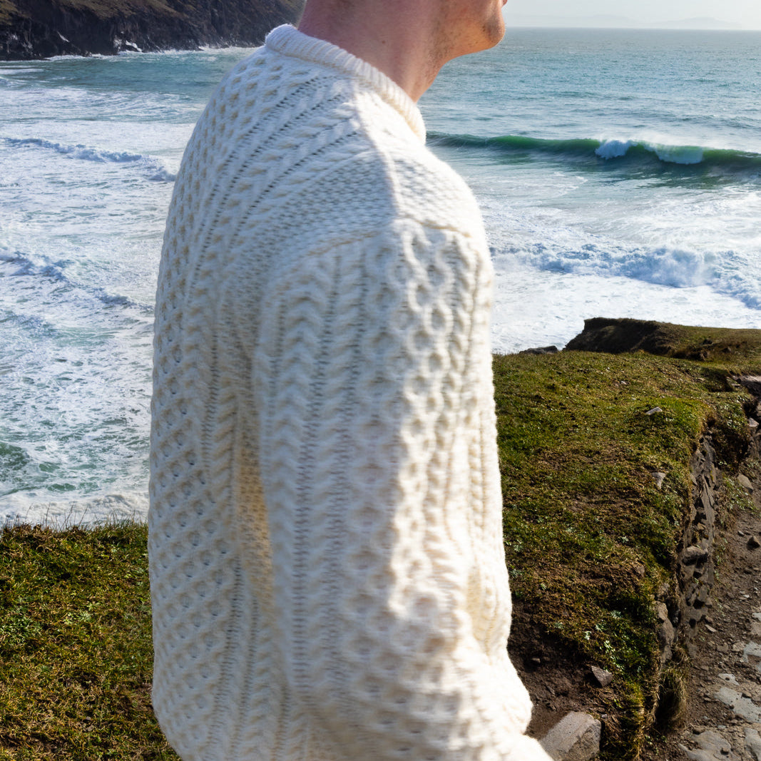 Irish Aran Knit Sweater – A Timeless Blend of Tradition &amp; Comfort 🇮🇪✨

Experience the perfect fusion of heritage and modern style with our unisex Irish Aran Knit Sweater, crafted in Ireland from 100% super-soft Merino wool. 🌿

✔️ Unmatched Comfort – Soft, breathable, and durable for all-season wear.
✔️ Authentic Aran Design – Showcasing classic stitches like cable, honeycomb, and diamond, each symbolizing strength, luck, and connection. 🍀
✔️ Crafted in Ireland – Hand-finished by skilled artisans, 
