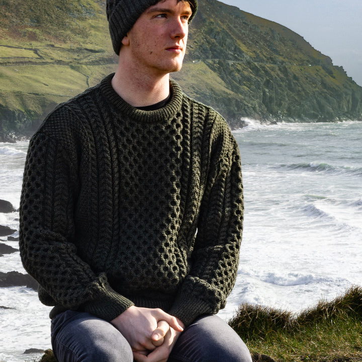 Irish Aran Knit Sweater – Timeless Craftsmanship and Comfort

Discover the perfect blend of tradition and style with our unisex Irish Aran Knit Sweater, crafted in Ireland using 100% super-soft Merino wool. 🌿

Luxurious Comfort: Soft, durable, and naturally breathable for year-round wear.
Rich Heritage: Features iconic Aran stitches like cable, honeycomb, and diamond, symbolizing strength, luck, and connection.
Crafted in Ireland: Made with care by skilled artisans, celebrating Irish knitting traditions.
