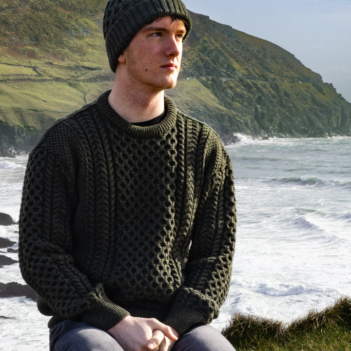 Irish Aran Knit Sweater – Timeless Craftsmanship and Comfort

Discover the perfect blend of tradition and style with our unisex Irish Aran Knit Sweater, crafted in Ireland using 100% super-soft Merino wool. 🌿

Luxurious Comfort: Soft, durable, and naturally breathable for year-round wear.
Rich Heritage: Features iconic Aran stitches like cable, honeycomb, and diamond, symbolizing strength, luck, and connection.
Crafted in Ireland: Made with care by skilled artisans, celebrating Irish knitting traditions.