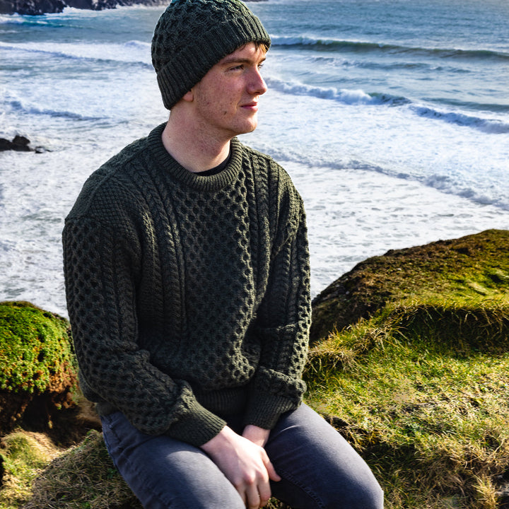 Irish Aran Knit Sweater – Timeless Craftsmanship and Comfort

Discover the perfect blend of tradition and style with our unisex Irish Aran Knit Sweater, crafted in Ireland using 100% super-soft Merino wool. 🌿

Luxurious Comfort: Soft, durable, and naturally breathable for year-round wear.
Rich Heritage: Features iconic Aran stitches like cable, honeycomb, and diamond, symbolizing strength, luck, and connection.
Crafted in Ireland: Made with care by skilled artisans, celebrating Irish knitting traditions.
