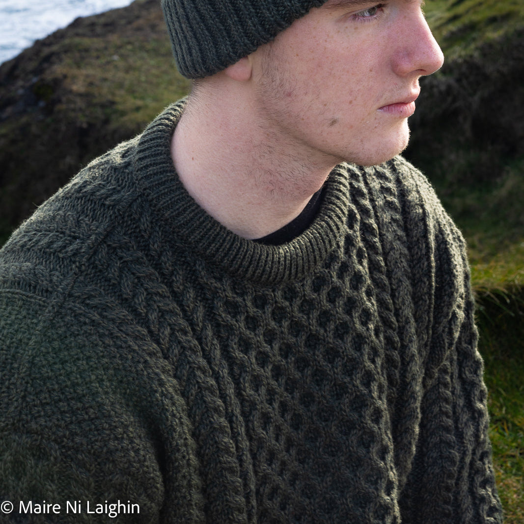 Irish Aran Knit Sweater – A Timeless Blend of Tradition &amp;amp; Comfort 🇮🇪✨

Experience the perfect fusion of heritage and modern style with our unisex Irish Aran Knit Sweater, crafted in Ireland from 100% super-soft Merino wool. 🌿

✔️ Unmatched Comfort – Soft, breathable, and durable for all-season wear.
✔️ Authentic Aran Design – Showcasing classic stitches like cable, honeycomb, and diamond, each symbolizing strength, luck, and connection. 🍀
✔️ Crafted in Ireland – Hand-finished by skilled artisans, pr