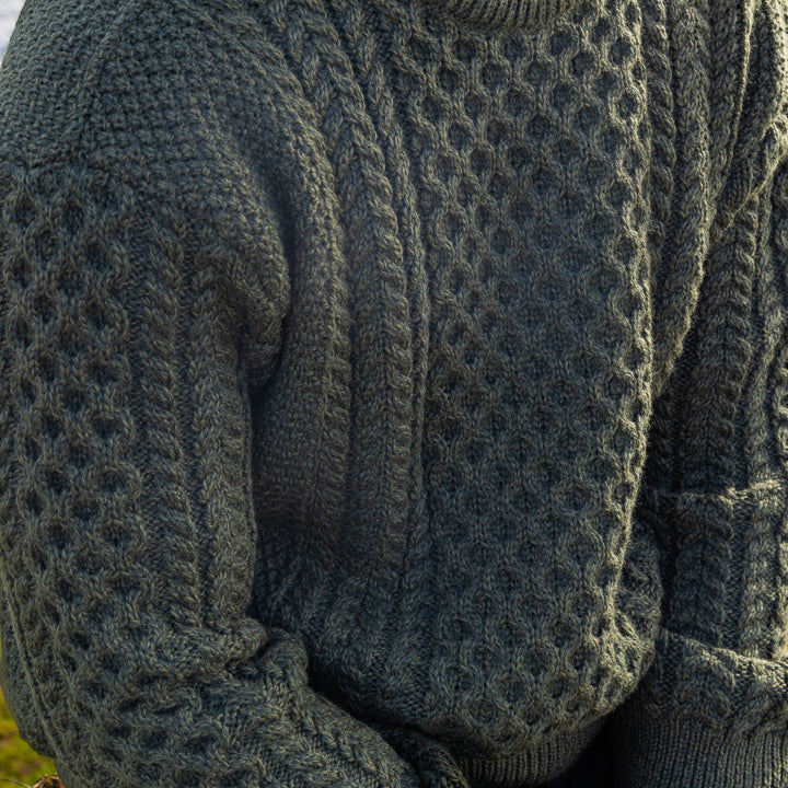 Irish Aran Knit Sweater – A Timeless Blend of Tradition &amp;amp; Comfort 🇮🇪✨

Experience the perfect fusion of heritage and modern style with our unisex Irish Aran Knit Sweater, crafted in Ireland from 100% super-soft Merino wool. 🌿

✔️ Unmatched Comfort – Soft, breathable, and durable for all-season wear.
✔️ Authentic Aran Design – Showcasing classic stitches like cable, honeycomb, and diamond, each symbolizing strength, luck, and connection. 🍀
✔️ Crafted in Ireland – Hand-finished by skilled artisans, pr