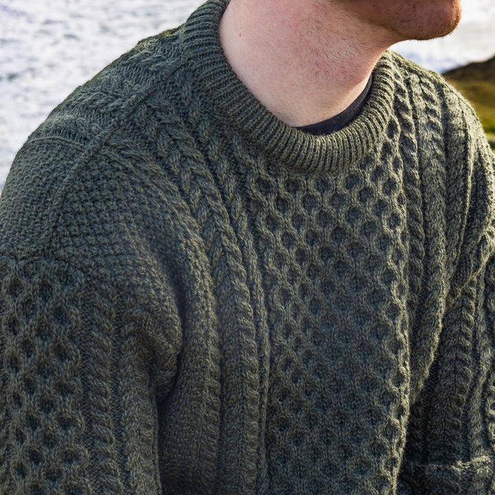 Irish Aran Knit Sweater – A Timeless Blend of Tradition &amp; Comfort 🇮🇪✨

Experience the perfect fusion of heritage and modern style with our unisex Irish Aran Knit Sweater, crafted in Ireland from 100% super-soft Merino wool. 🌿

✔️ Unmatched Comfort – Soft, breathable, and durable for all-season wear.
✔️ Authentic Aran Design – Showcasing classic stitches like cable, honeycomb, and diamond, each symbolizing strength, luck, and connection. 🍀
