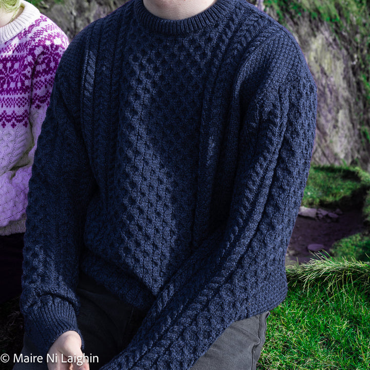 Irish Aran Knit Sweater – A Timeless Blend of Tradition &amp;amp; Comfort 🇮🇪✨

Experience the perfect fusion of heritage and modern style with our unisex Irish Aran Knit Sweater, crafted in Ireland from 100% super-soft Merino wool. 🌿

✔️ Unmatched Comfort – Soft, breathable, and durable for all-season wear.
✔️ Authentic Aran Design – Showcasing classic stitches like cable, honeycomb, and diamond, each symbolizing strength, luck, and connection. 🍀
✔️ Crafted in Ireland – Hand-finished by skilled artisans, pr