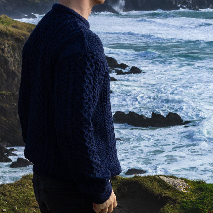 Irish Aran Knit Sweater – Timeless Craftsmanship and Comfort

Discover the perfect blend of tradition and style with our unisex Irish Aran Knit Sweater, crafted in Ireland using 100% super-soft Merino wool. 🌿

Luxurious Comfort: Soft, durable, and naturally breathable for year-round wear.
Rich Heritage: Features iconic Aran stitches like cable, honeycomb, and diamond, symbolizing strength, luck, and connection.
Crafted in Ireland: Made with care by skilled artisans, celebrating Irish knitting traditions.
V
