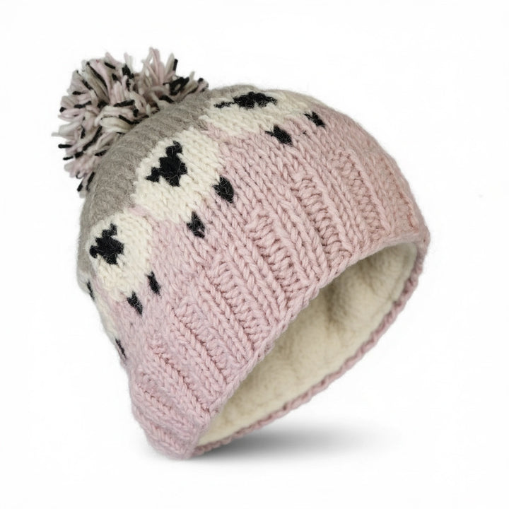 🐑🧤Irish Wool Bobble Hats– Hand-Knitted with Charming Sheep DesignStay warm in style with these hand-knitted Irish wool bobble hat, featuring a playful sheep pattern that celebrates Ireland’s rich farming heritage and rolling green hills 🐑🌿.