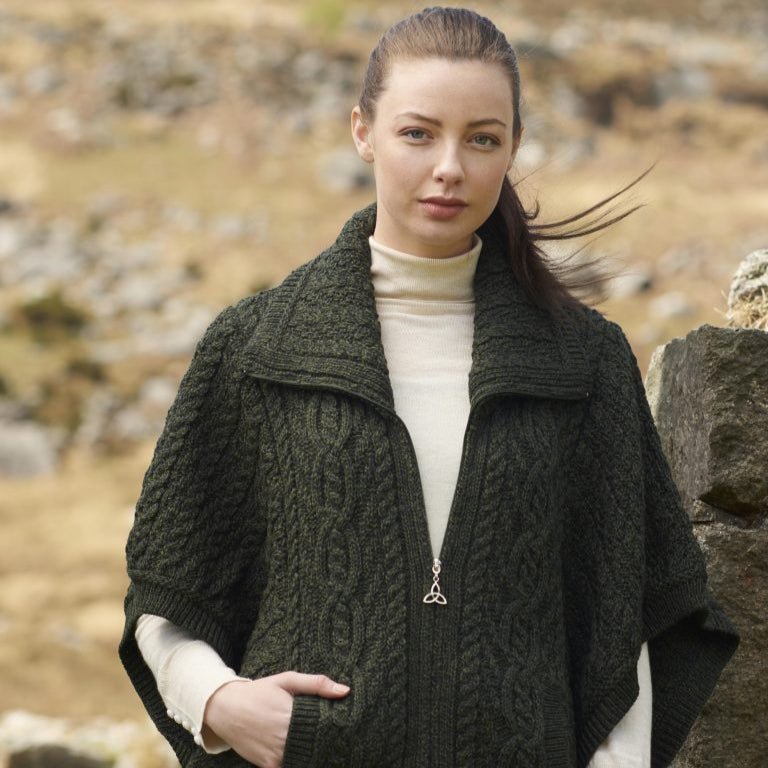 Wool Funnel Neck Irish Knitted Jacket – Timeless Style &amp; Warmth

Stay cozy and chic with our 100% Merino Wool Funnel Neck Jacket, blending traditional Irish craftsmanship with a modern twist.

✨ Key Features:

Material: Luxuriously soft and durable 100% Merino wool.
Design: Stylish funnel neck with a double collar for warmth and elegance.
Details: Classic Aran stitching and Celtic Knot accents on zip and buttons.
Fit: Modern batwing sleeves for a relaxed silhouette.
Colors: Parsnip, Army Green, Midnight.