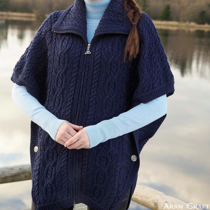 Wool Funnel Neck Irish Knitted Jacket – Timeless Style &amp; Warmth

Stay cozy and chic with our 100% Merino Wool Funnel Neck Jacket, blending traditional Irish craftsmanship with a modern twist.

✨ Key Features:

Material: Luxuriously soft and durable 100% Merino wool.
Design: Stylish funnel neck with a double collar for warmth and elegance.
Details: Classic Aran stitching and Celtic Knot accents on zip and buttons.
Fit: Modern batwing sleeves for a relaxed silhouette.
Colors: Parsnip, Army Green, Midnight.
