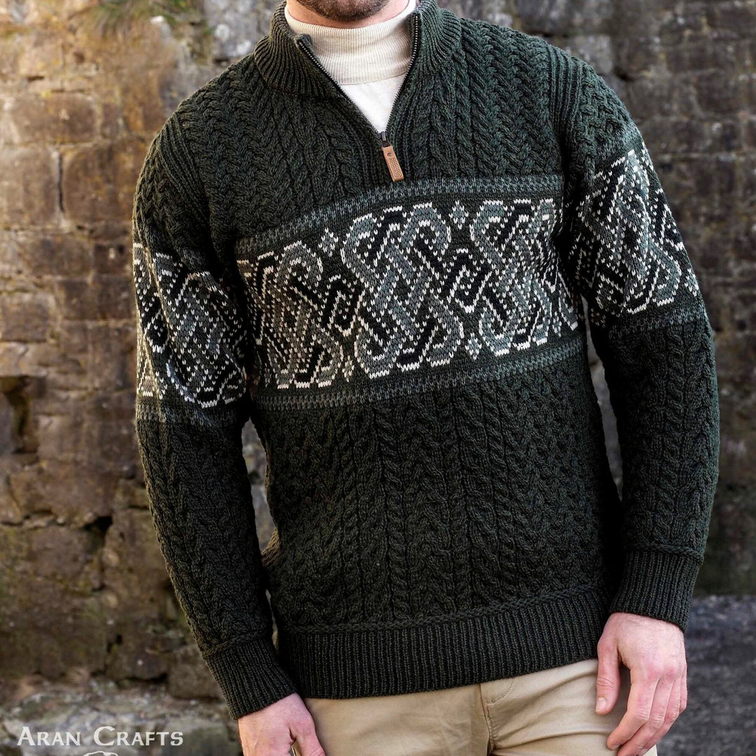 Celtic Jacquard Design Aran Half-Zipped Sweater – 100% Natural Merino Wool 🇮🇪

Color Options: Oatmeal, Charcoal, Dark Green
Material: 100% Natural Merino Wool
Sizes: Small to XXLarge
Made in Ireland 🍀

Product Description:
Embrace warmth and tradition with our Celtic Jacquard Aran Half-Zip Sweater. Crafted from 100% Merino wool, it combines comfort, durability, and a stunning Celtic design woven in tundra green and mallard blue.