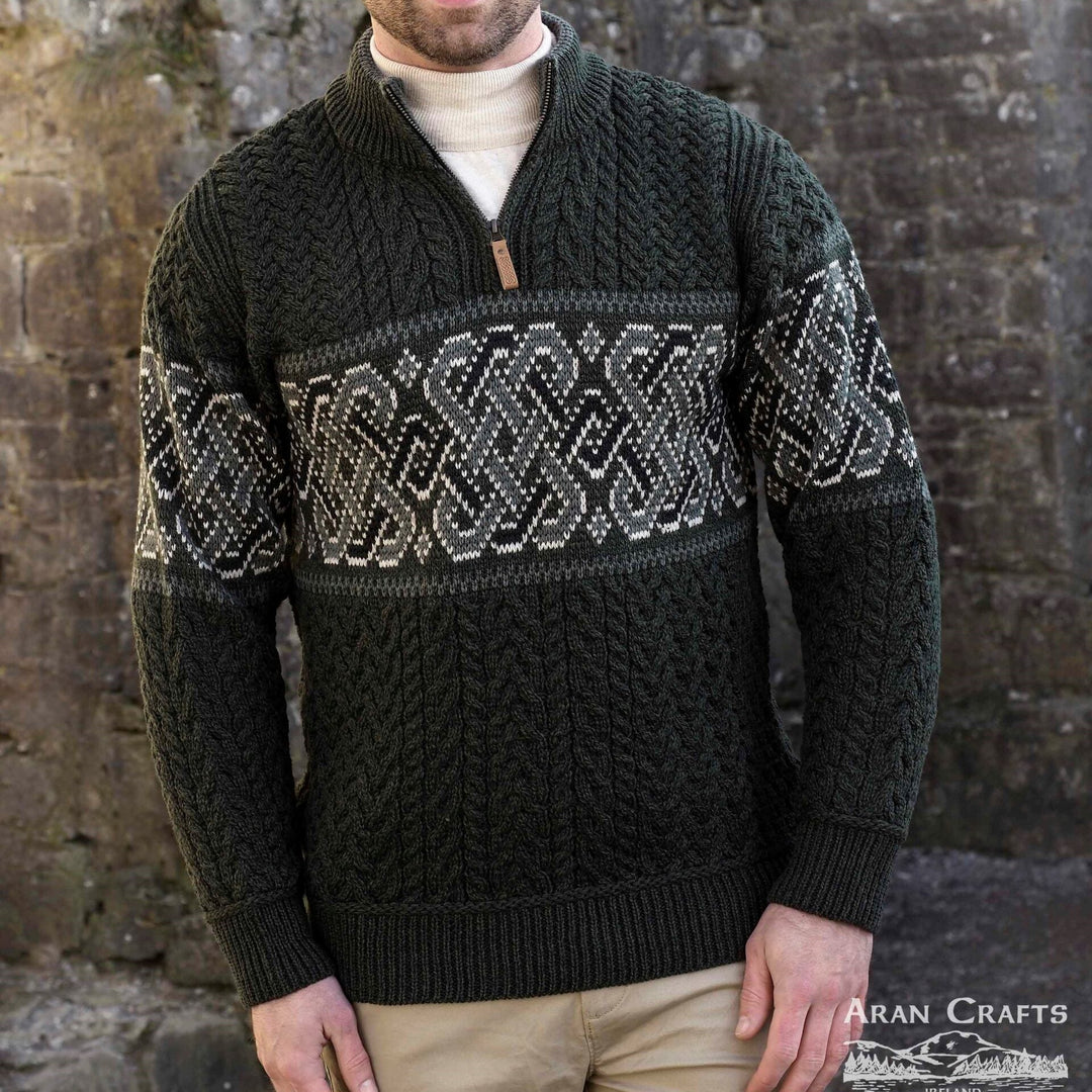 Celtic Jacquard Design Aran Half-Zipped Sweater – 100% Natural Merino Wool 🇮🇪

Color Options: Oatmeal, Charcoal, Dark Green
Material: 100% Natural Merino Wool
Sizes: Small to XXLarge
Made in Ireland 🍀

Product Description:
Embrace warmth and tradition with our Celtic Jacquard Aran Half-Zip Sweater. Crafted from 100% Merino wool, it combines comfort, durability, and a stunning Celtic design woven in tundra green and mallard blue.

Key Features:

Soft Merino Wool: Warm, soft, and durable 🌟
Celtic Jacquard