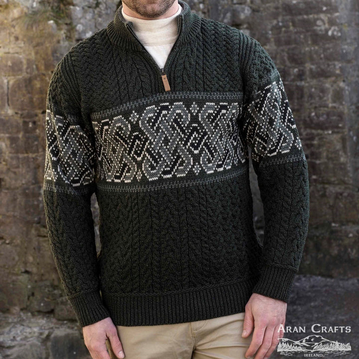 Celtic Jacquard Design Aran Half-Zipped Sweater – 100% Natural Merino Wool 🇮🇪

Color Options: Oatmeal, Charcoal, Dark Green
Material: 100% Natural Merino Wool
Sizes: Small to XXLarge
Made in Ireland 🍀

Product Description:
Embrace warmth and tradition with our Celtic Jacquard Aran Half-Zip Sweater. Crafted from 100% Merino wool, it combines comfort, durability, and a stunning Celtic design woven in tundra green and mallard blue.