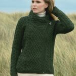 ☘️ Ladies Irish-Made Side-Zip Cable Knit Aran Cardigan 🧶
Biker Style Meets Timeless Irish Craftsmanship

Elevate your wardrobe with the Ladies Irish-Made Side-Zip Cable Knit Aran Cardigan, a bold take on traditional Aran knitwear with a modern, biker-inspired twist.

🌟 Key Features You’ll Love:
🧵 Premium Material: Made from 100% Supersoft Merino Wool for unmatched warmth, softness, and comfort.
🪡 Stylish Design: Features a unique side-zip closure, adding a modern biker edge to the classic Aran ca
