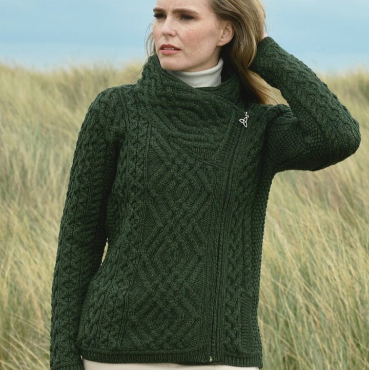 ☘️ Ladies Irish-Made Side-Zip Cable Knit Aran Cardigan 🧶
Biker Style Meets Timeless Irish Craftsmanship

Elevate your wardrobe with the Ladies Irish-Made Side-Zip Cable Knit Aran Cardigan, a bold take on traditional Aran knitwear with a modern, biker-inspired twist.

🌟 Key Features You’ll Love:
🧵 Premium Material: Made from 100% Supersoft Merino Wool for unmatched warmth, softness, and comfort.
🪡 Stylish Design: Features a unique side-zip closure, adding a modern biker edge to the classic Aran ca
