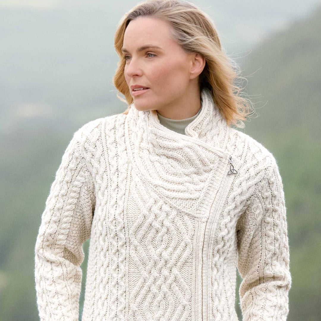 ☘️ Ladies Irish-Made Side-Zip Cable Knit Aran Cardigan 🧶
Biker Style Meets Timeless Irish Craftsmanship

Elevate your wardrobe with the Ladies Irish-Made Side-Zip Cable Knit Aran Cardigan, a bold take on traditional Aran knitwear with a modern, biker-inspired twist.

🌟 Key Features You’ll Love:
🧵 Premium Material: Made from 100% Supersoft Merino Wool for unmatched warmth, softness, and comfort.
🪡 Stylish Design: Features a unique side-zip closure, adding a modern biker edge to the classic Aran cardigan.