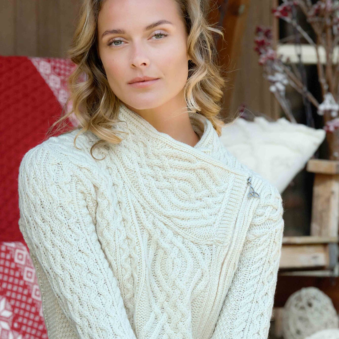 ☘️ Ladies Irish-Made Side-Zip Cable Knit Aran Cardigan 🧶
Biker Style Meets Timeless Irish Craftsmanship

Elevate your wardrobe with the Ladies Irish-Made Side-Zip Cable Knit Aran Cardigan, a bold take on traditional Aran knitwear with a modern, biker-inspired twist.

🌟 Key Features You’ll Love:
🧵 Premium Material: Made from 100% Supersoft Merino Wool for unmatched warmth, softness, and comfort.
🪡 Stylish Design: Features a unique side-zip closure, adding a modern biker edge to the classic Aran cardigan.