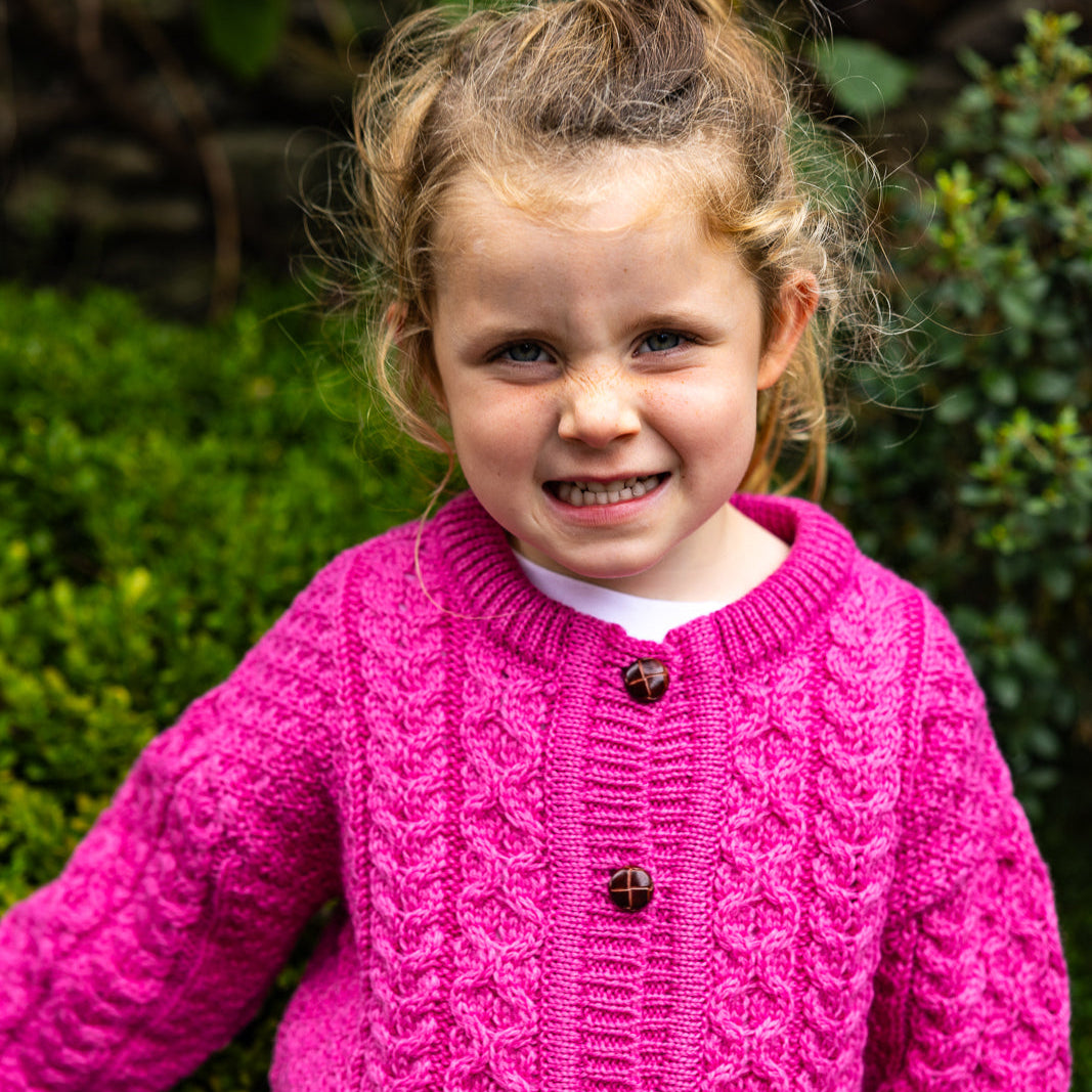 Children's Authentic Aran Knitwear – Irish Craftsmanship &amp; Timeless Style

Wrap your little ones in the enchanting warmth of authentic Aran knit cardigans and sweaters, crafted in Ireland with 100% soft merino wool for unbeatable comfort and durability.