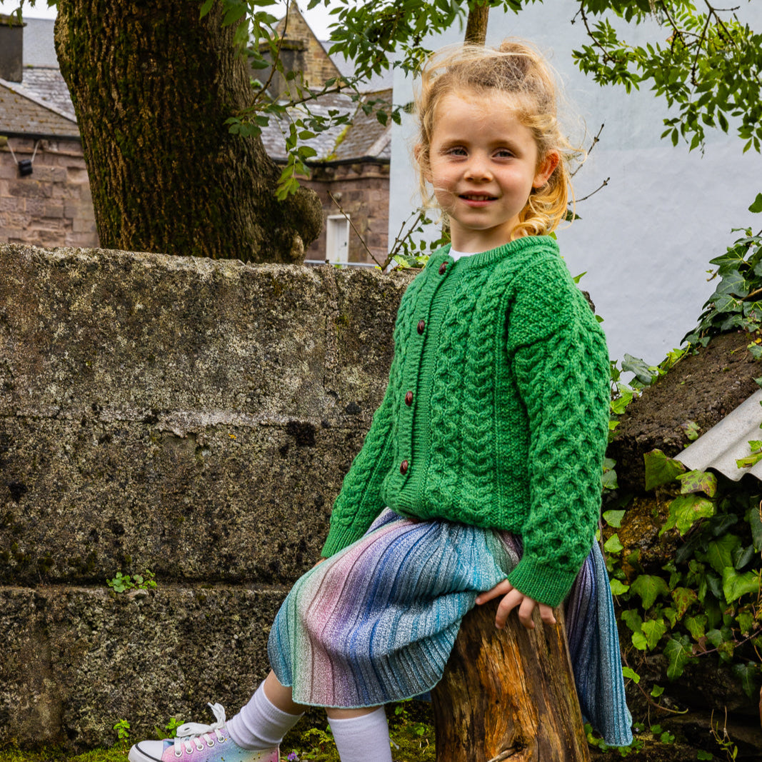Children's Authentic Aran Knitwear – Irish Craftsmanship &amp; Timeless Style

Wrap your little ones in the enchanting warmth of authentic Aran knit cardigans and sweaters, crafted in Ireland with 100% soft merino wool for unbeatable comfort and durability.