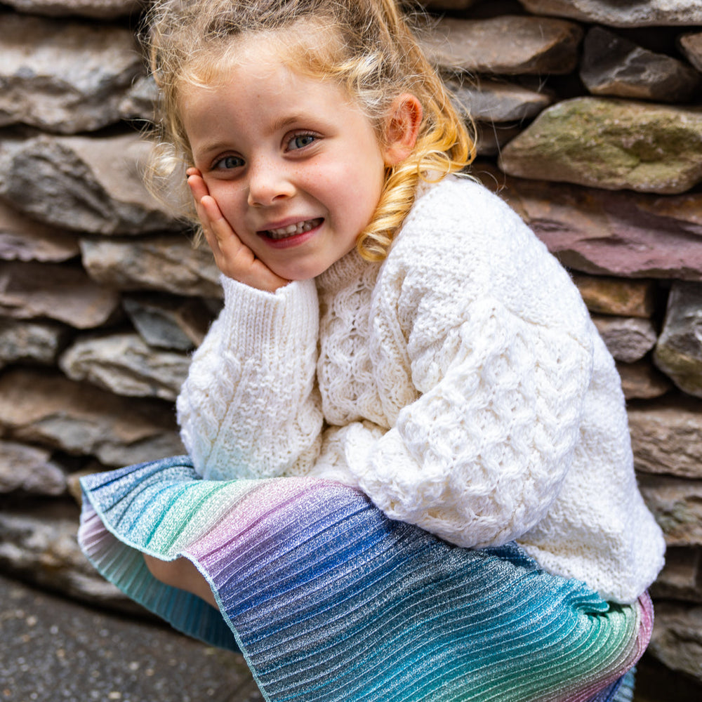 Children's Authentic Aran Knitwear – Irish Craftsmanship &amp; Timeless Style

Wrap your little ones in the enchanting warmth of authentic Aran knit cardigans and sweaters, crafted in Ireland with 100% soft merino wool for unbeatable comfort and durability.

🌟 Heritage Design: Featuring intricate Aran stitches like cable, honeycomb, and trinity, each piece tells a unique story.
🍂 Versatile Styles: From cozy crew necks to classic button-downs, perfect for layering or keeping warm.
